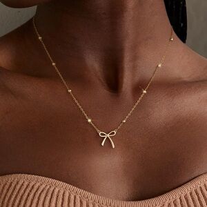 Elegant Gold Bow Necklace